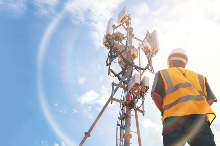 Engineer checking a cellular tower