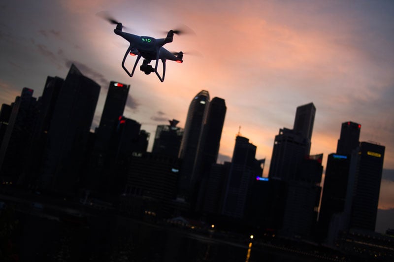 Drone flying across an urban landscape