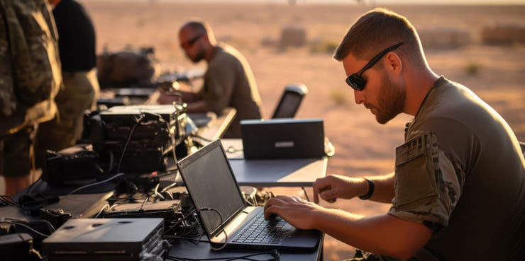 Soldiers analyzing data to dominate the spectrum